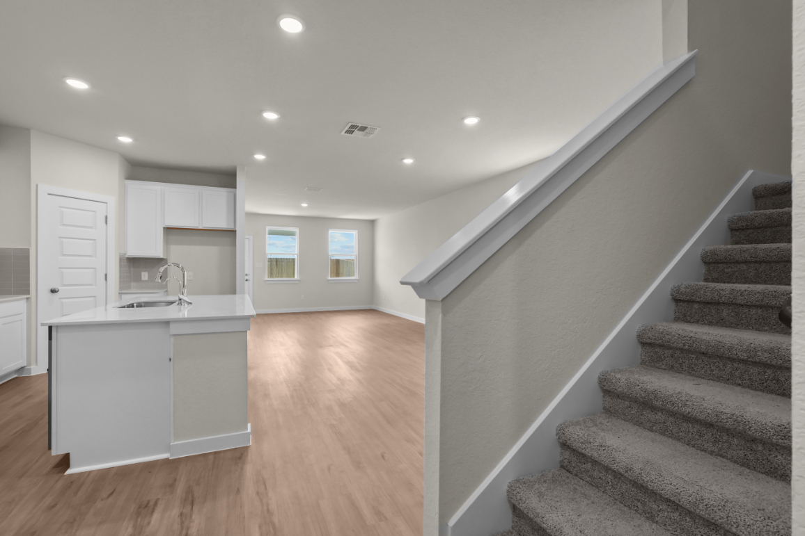 A kitchen and living room.