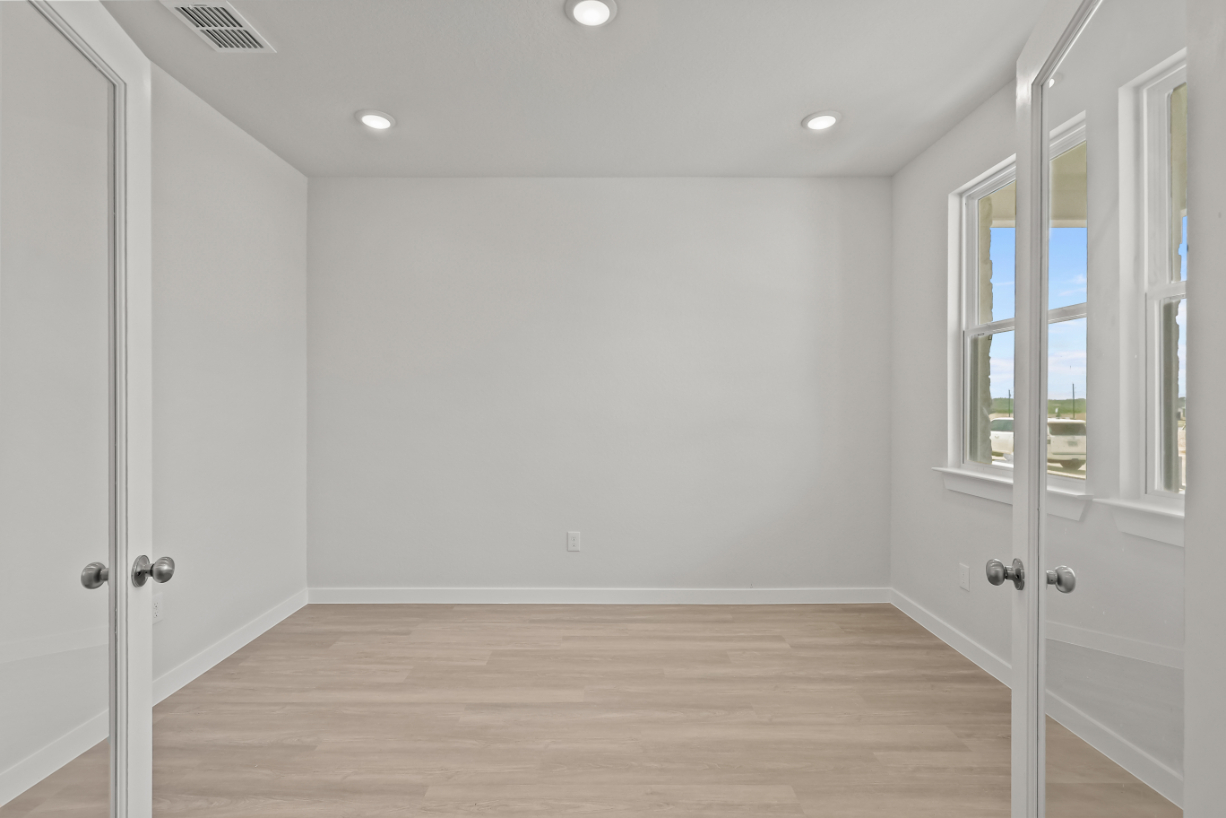 A room with white doors.