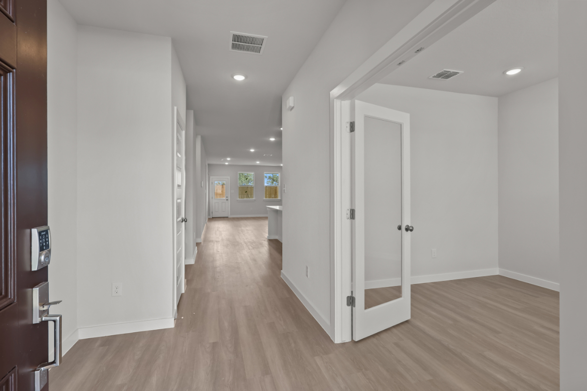 A room with white doors.