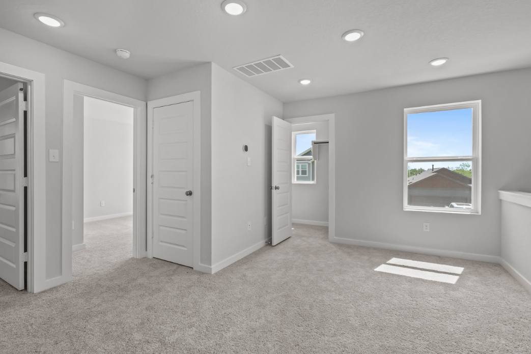 A room with white doors.