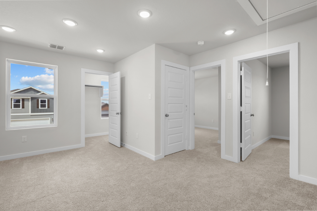 A room with white doors.