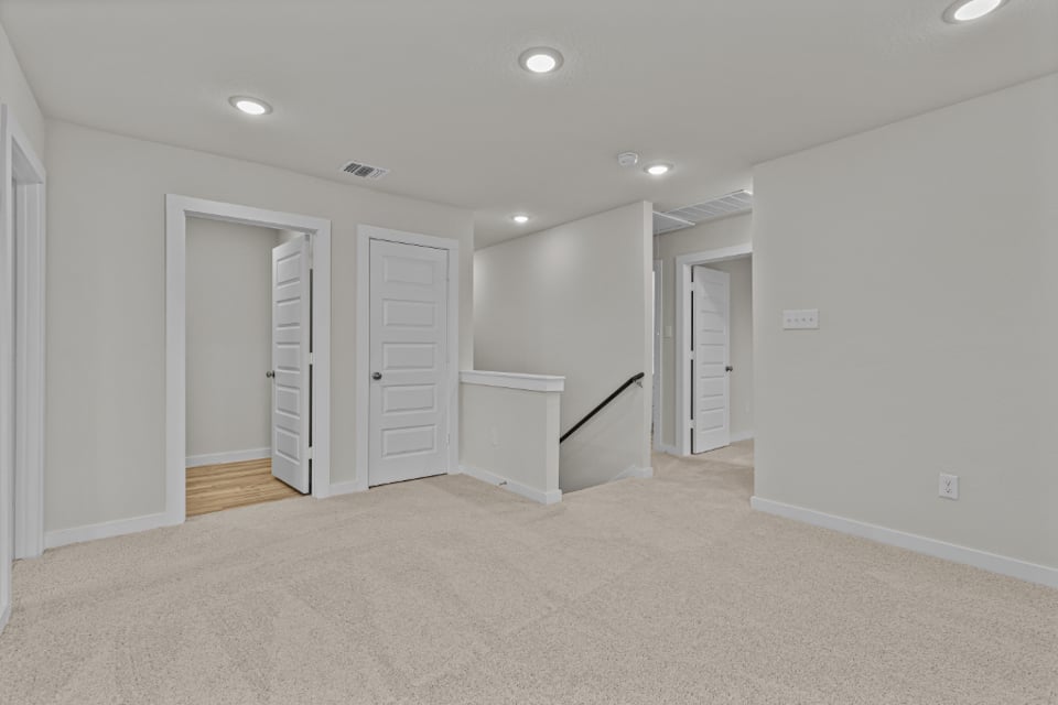 A room with white doors.