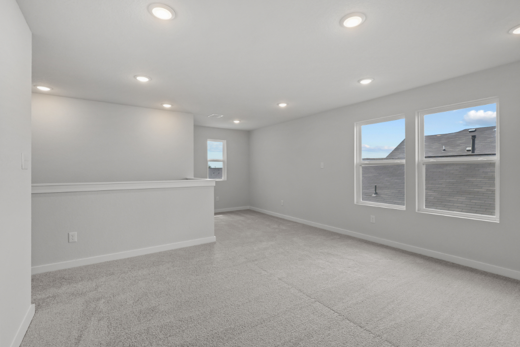 A room with a few windows.