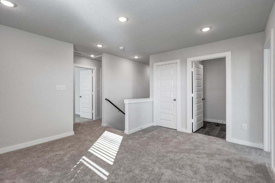 A room with white doors.