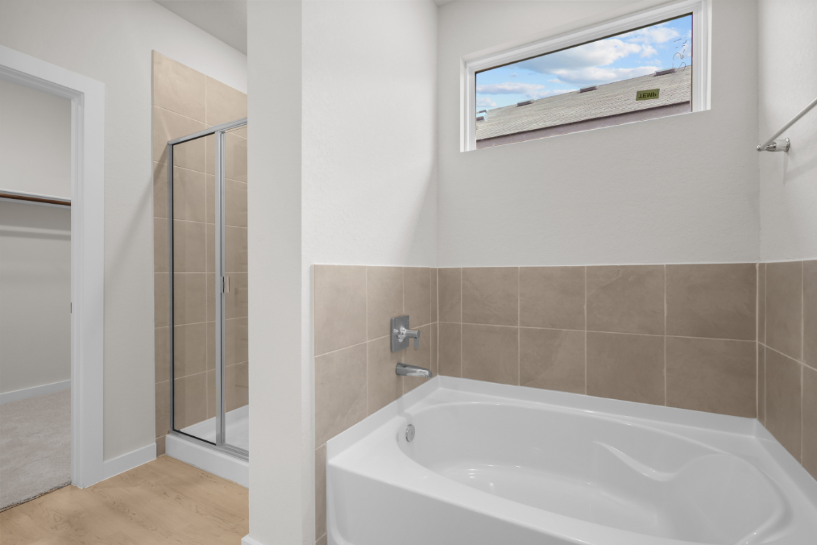 A bathroom with a glass shower.