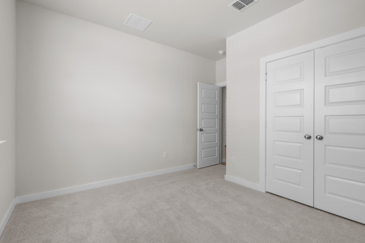 A room with white doors.