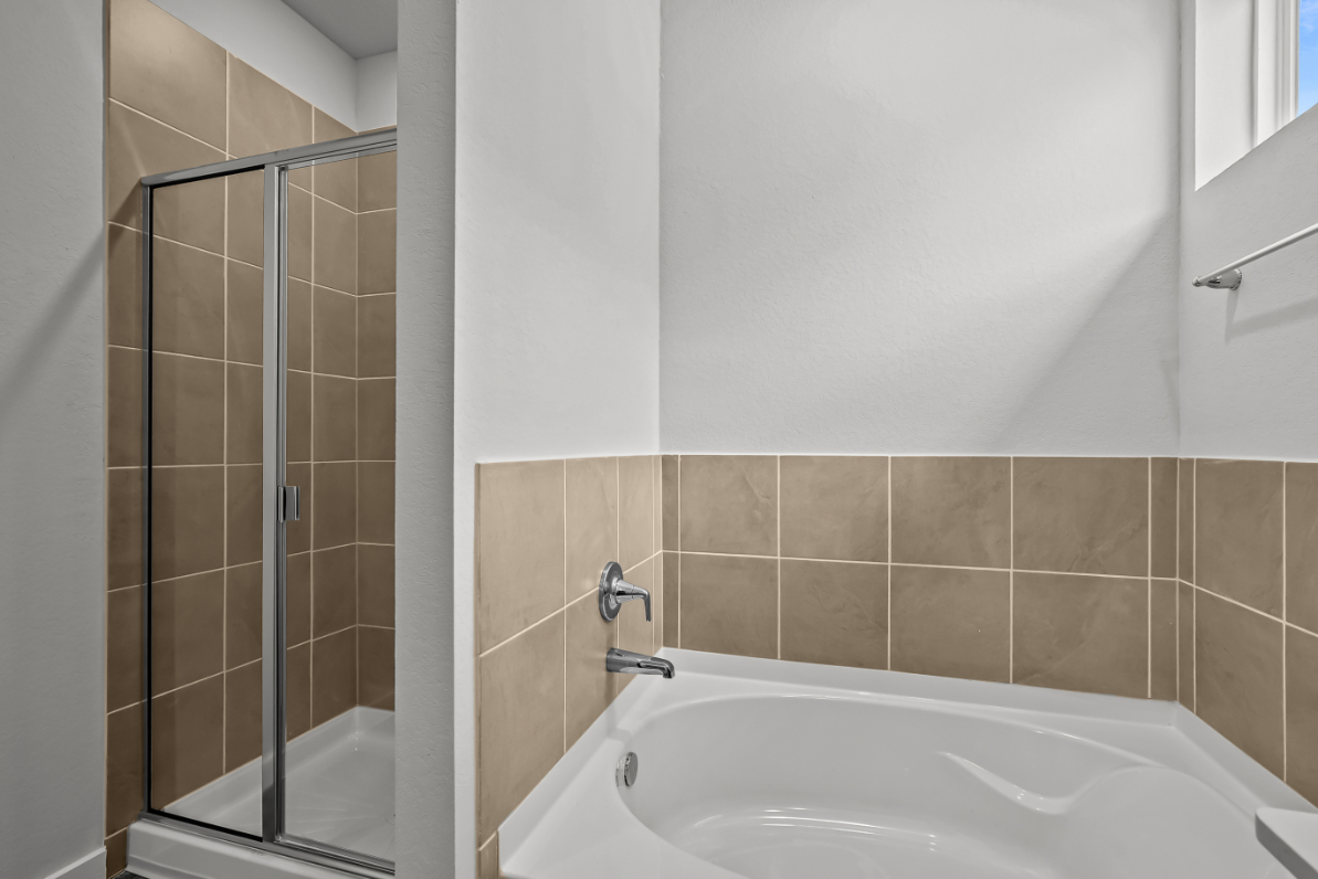 A bathroom with a glass shower.