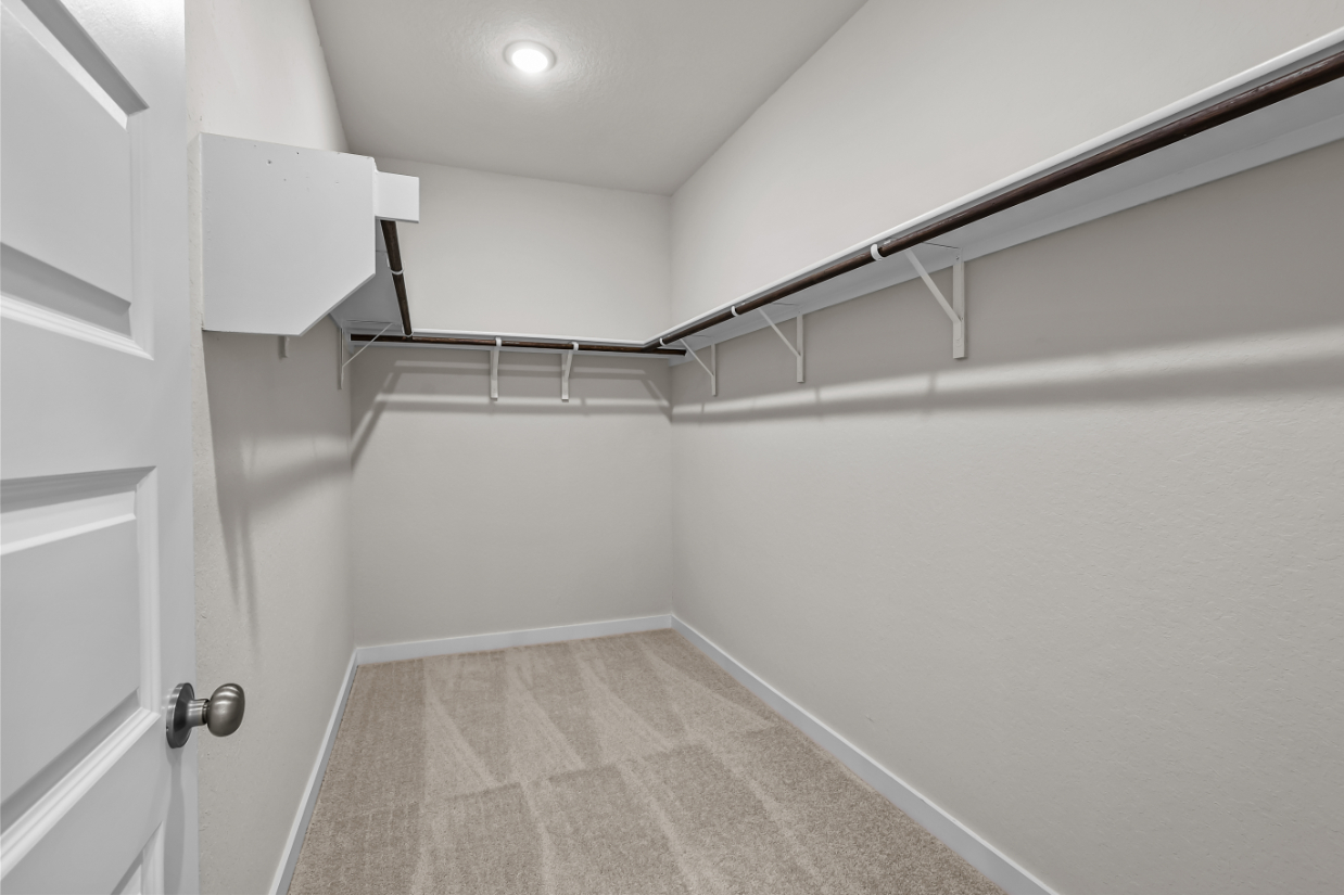 A white hallway with white walls.
