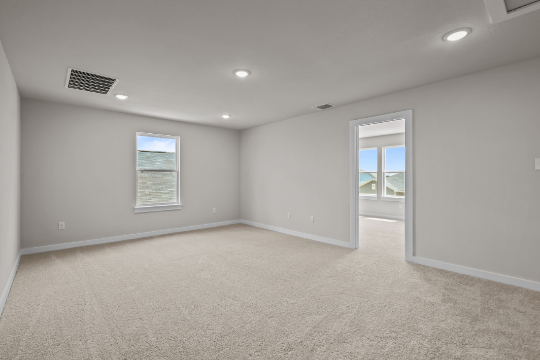 A room with a door and a window.