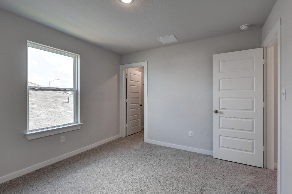 A room with white doors.