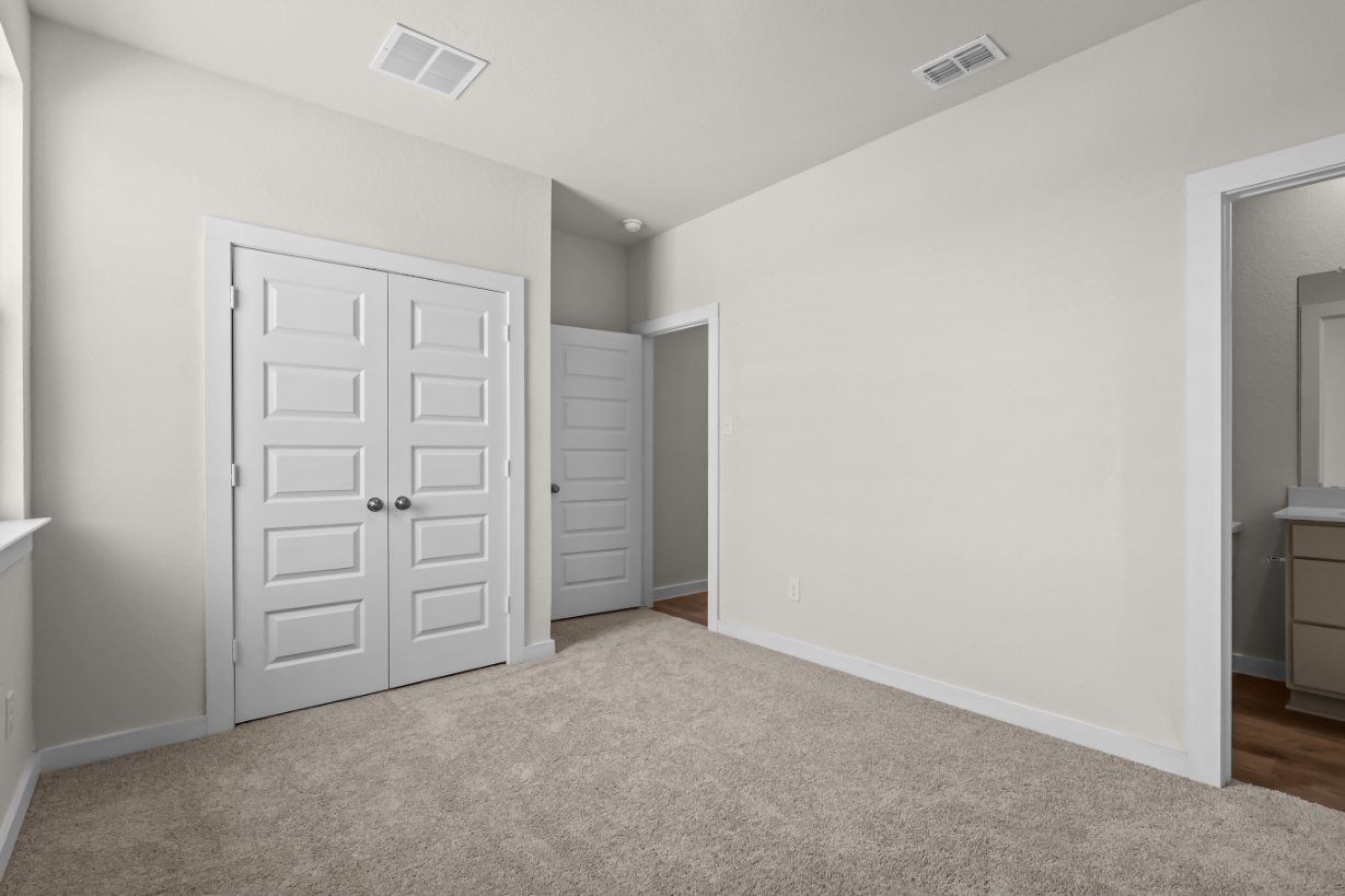 A room with white doors.