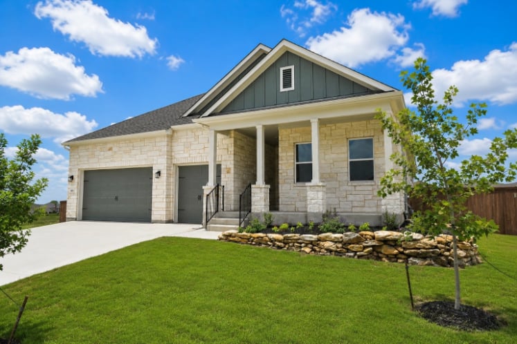 A house with a large front yard.