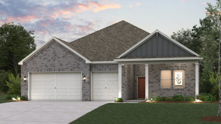 A house with garages and a lawn.