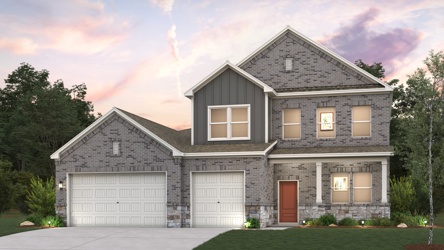 A house with garages and trees.