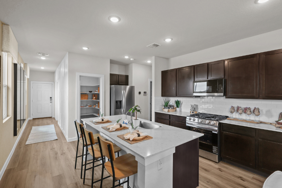 A kitchen with a large island.