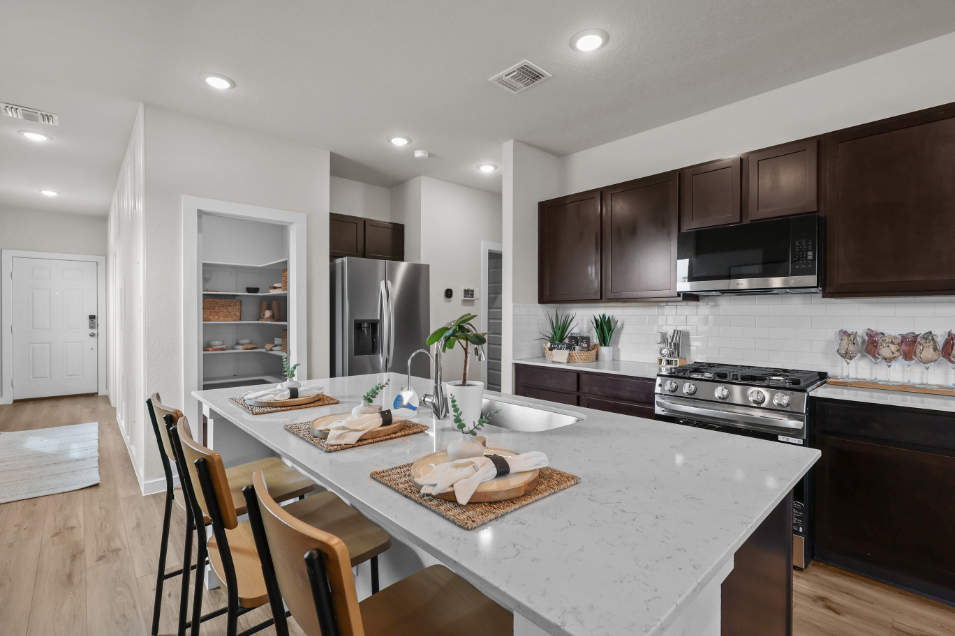 A kitchen with a large island.