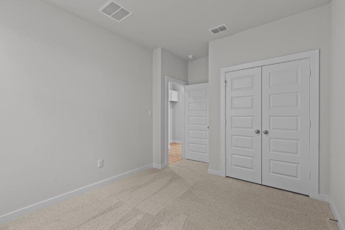 A room with white doors.