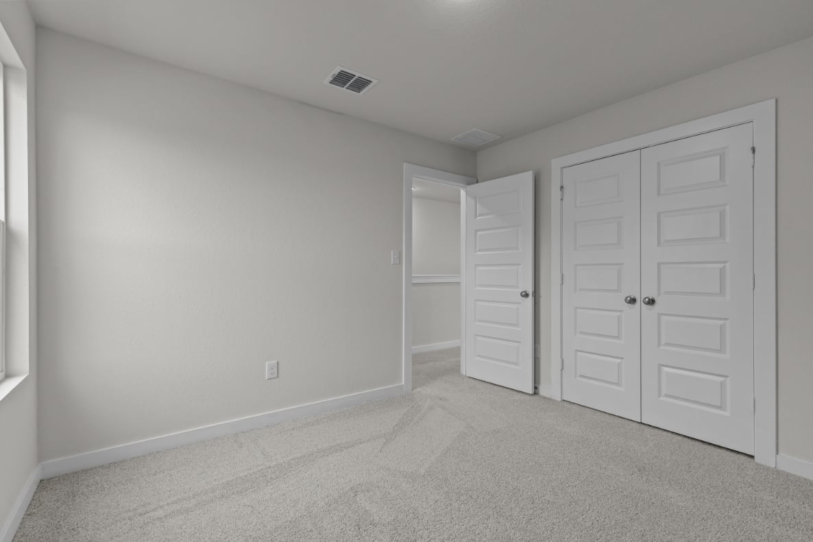 A room with white doors.
