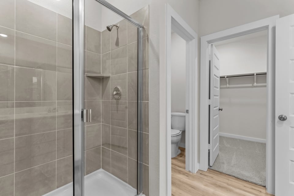 A bathroom with a glass shower.