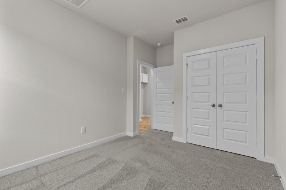 A room with white doors.