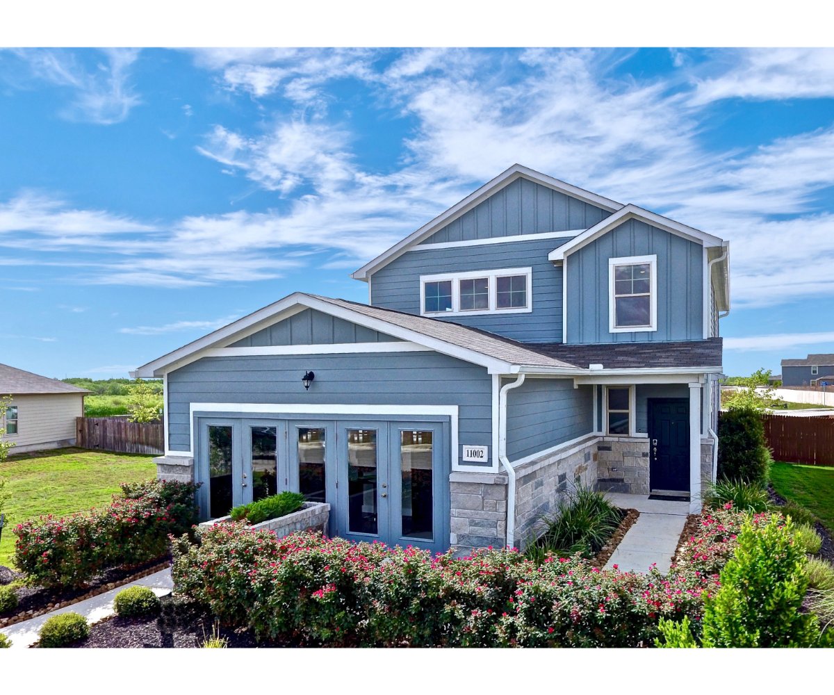 A house with a large front yard.