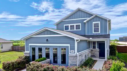 A house with a large front yard.