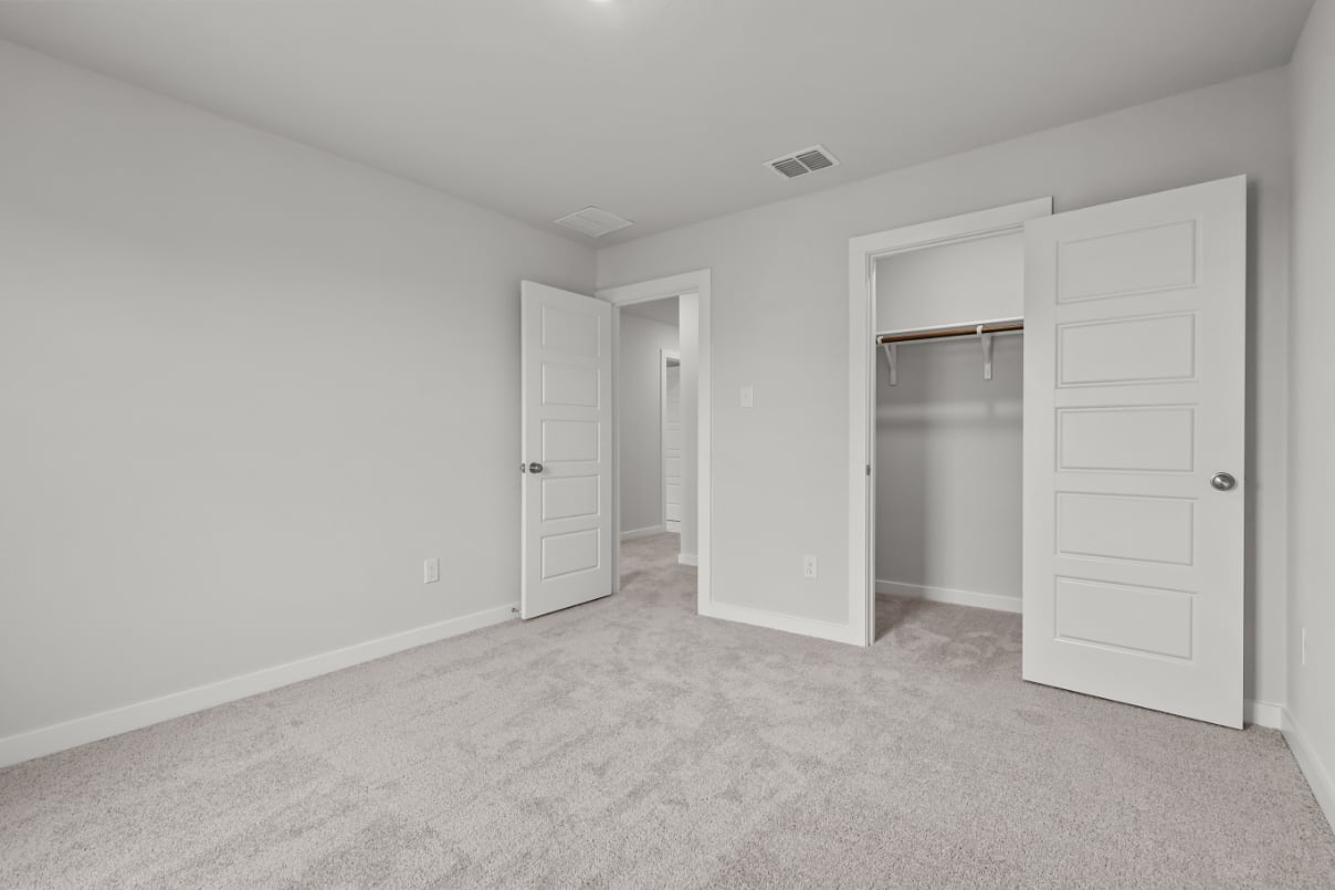 A room with white doors.