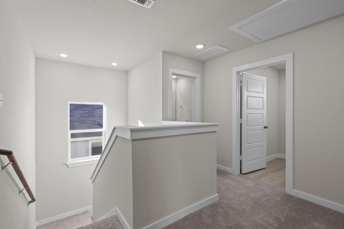 A bathroom with a sink and cabinets.