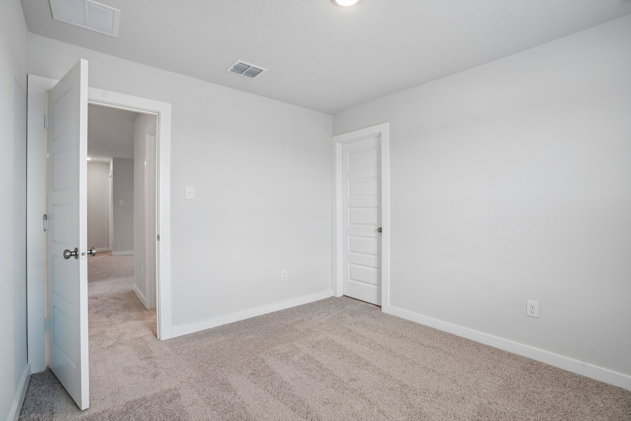 A room with white walls.