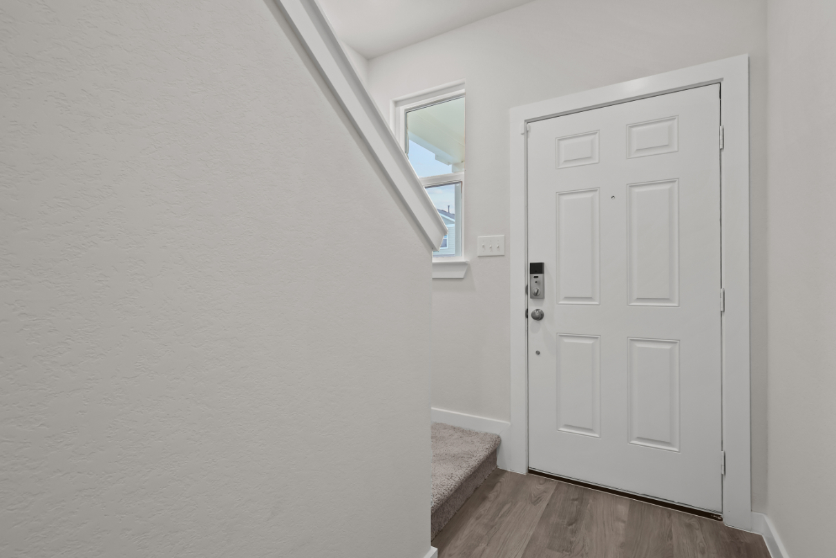 A white door in a room.