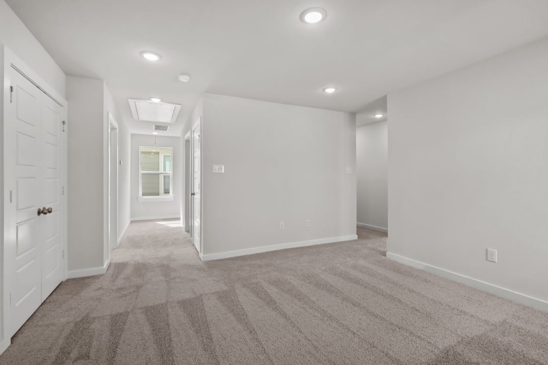 A room with white doors.