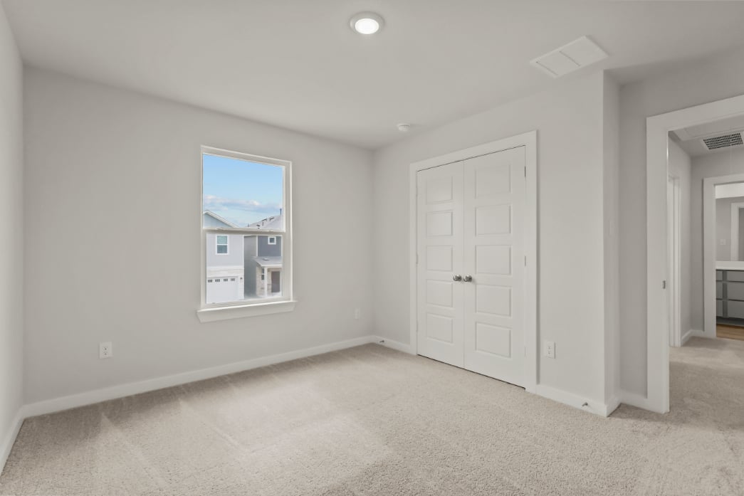 A room with white doors.