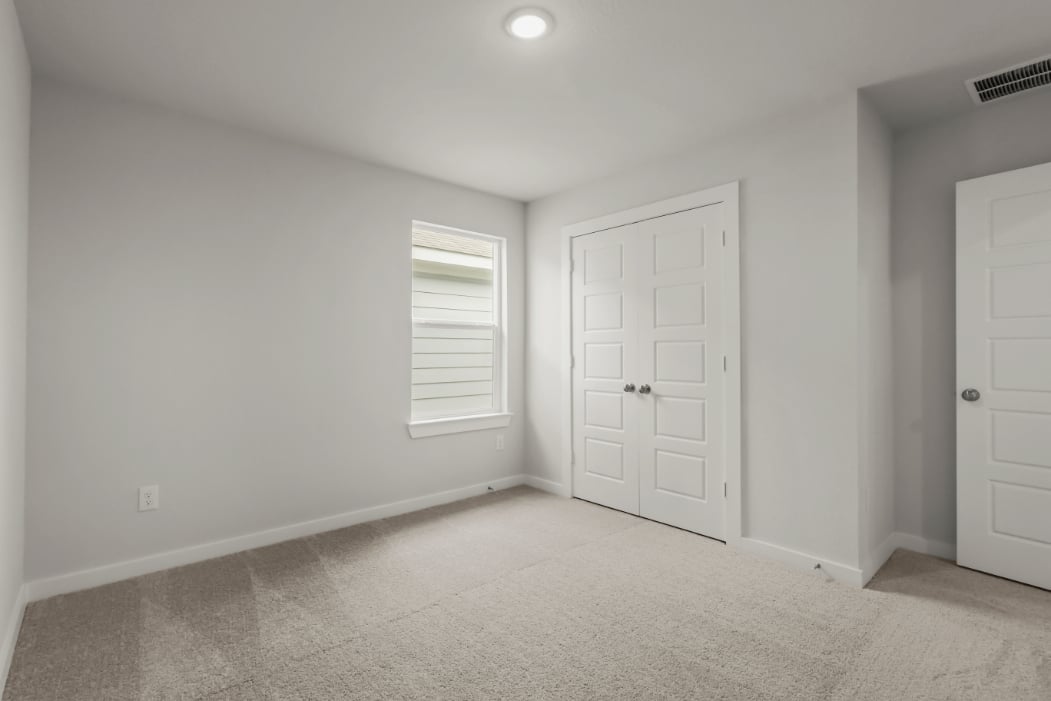 A room with white doors.