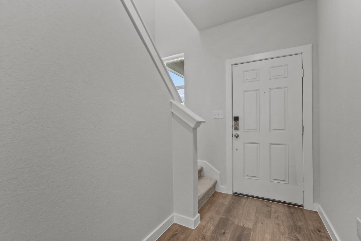 A white door in a room.