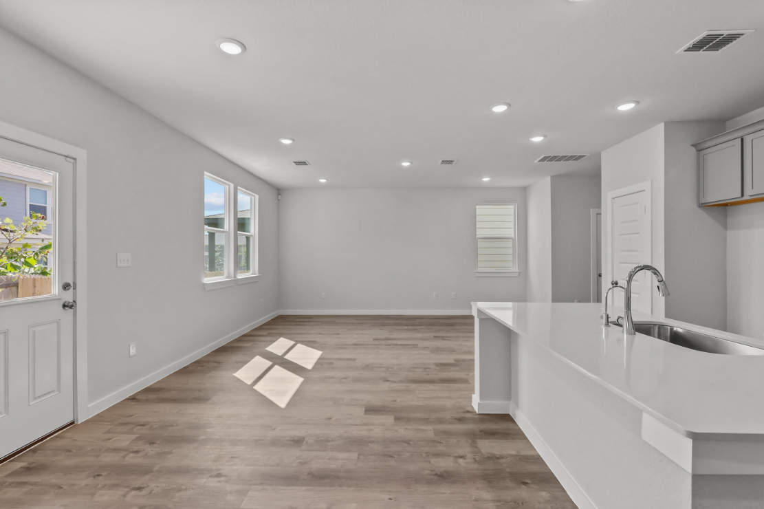 A bathroom with a tub and sink.