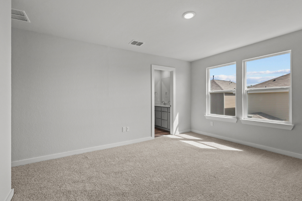 A room with a window and a door.