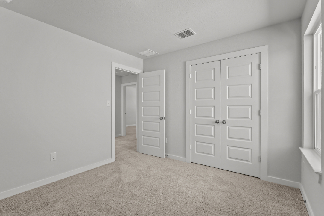 A room with white doors.