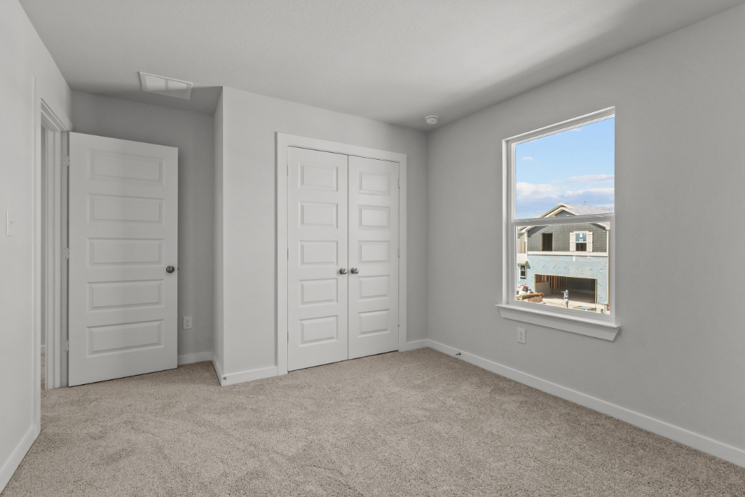 A room with white doors.