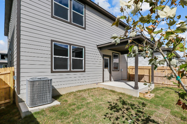 A house with a small yard.