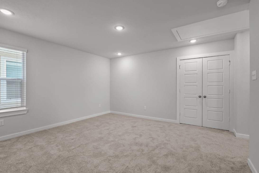 A room with white doors.