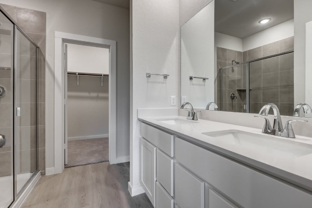 A bathroom with a glass shower.