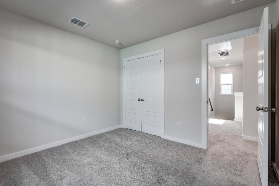 A room with white doors.