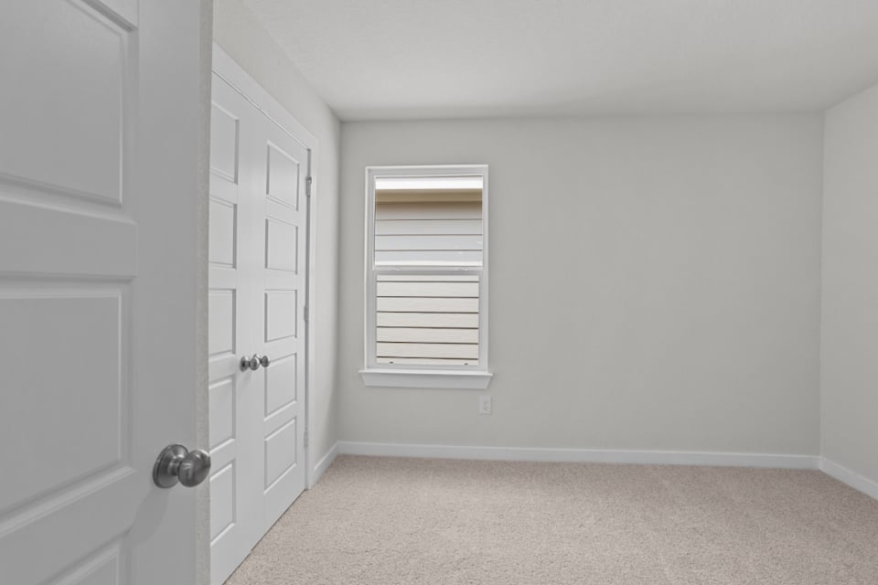 A room with white doors.