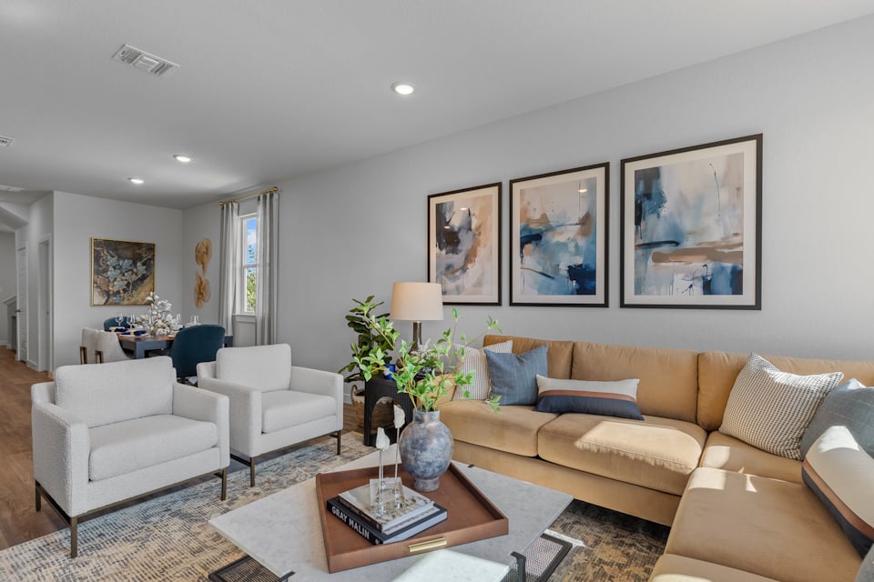 A living room with a couch and a coffee table.