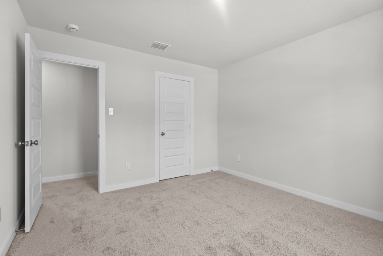A room with white doors.