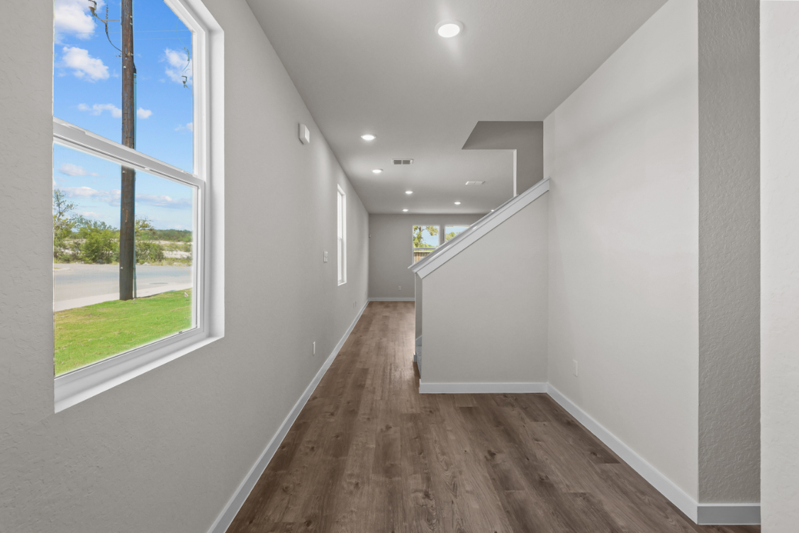 A hallway with windows.