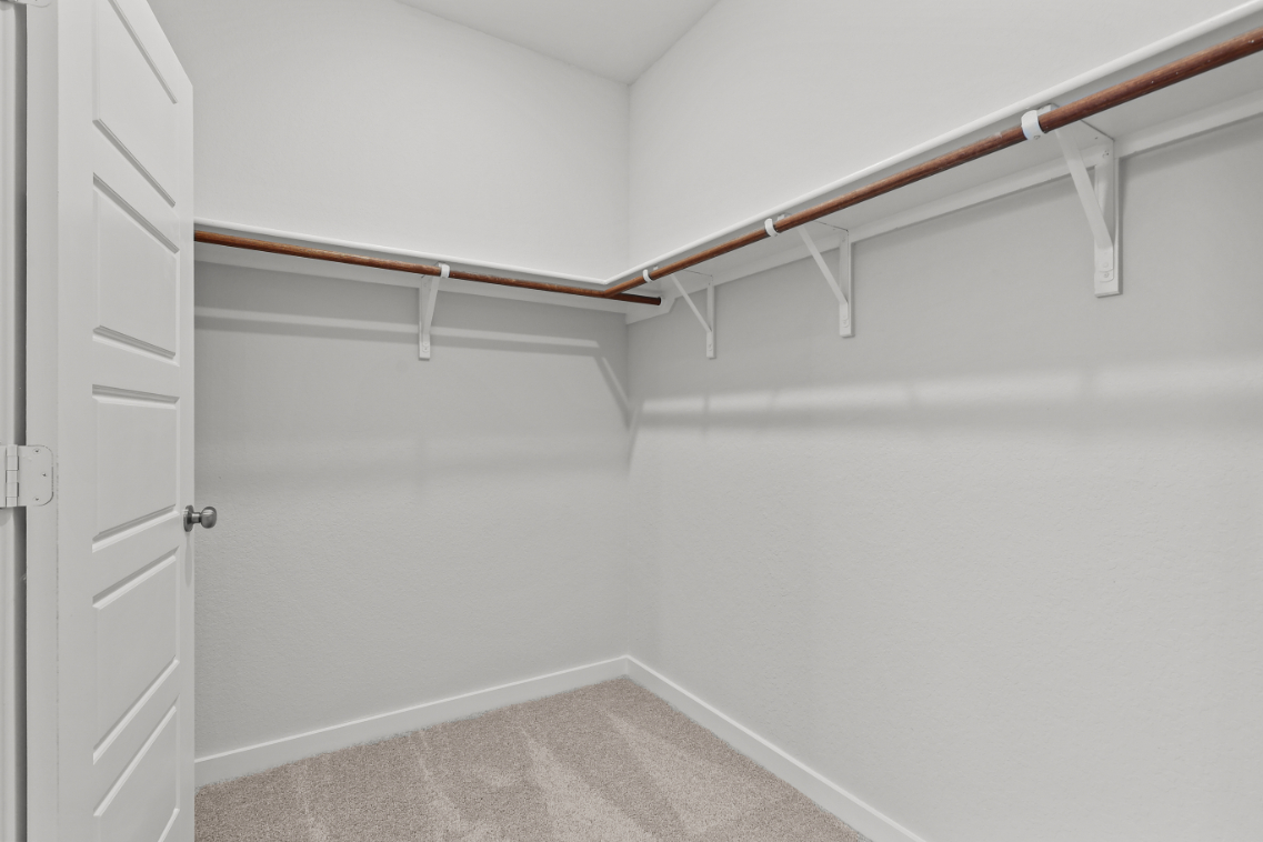 A white staircase in a room.