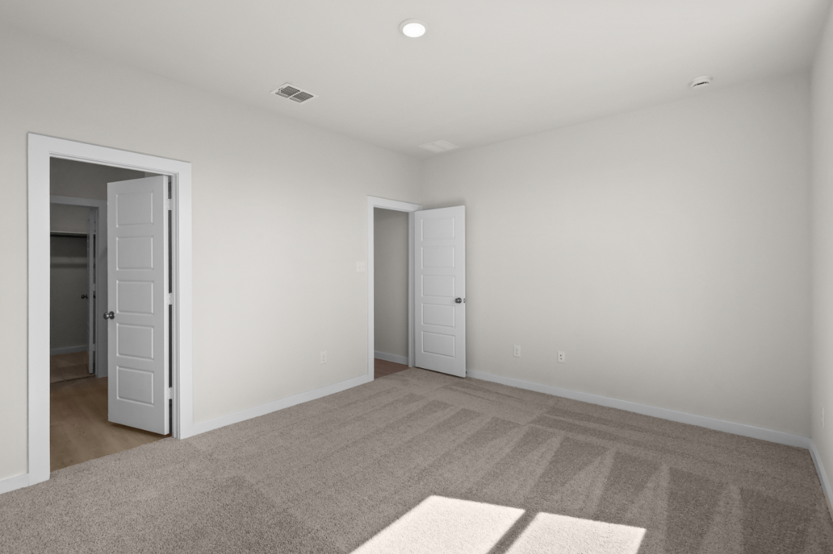 A room with white doors.