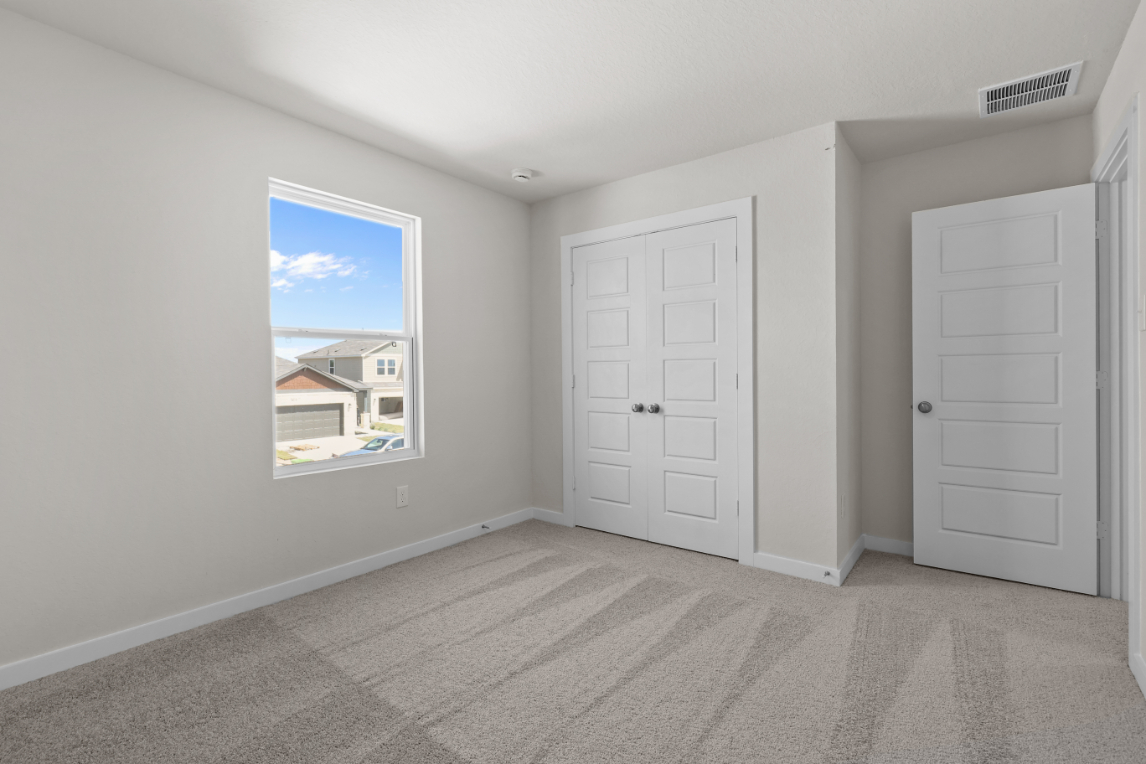 A room with white doors.