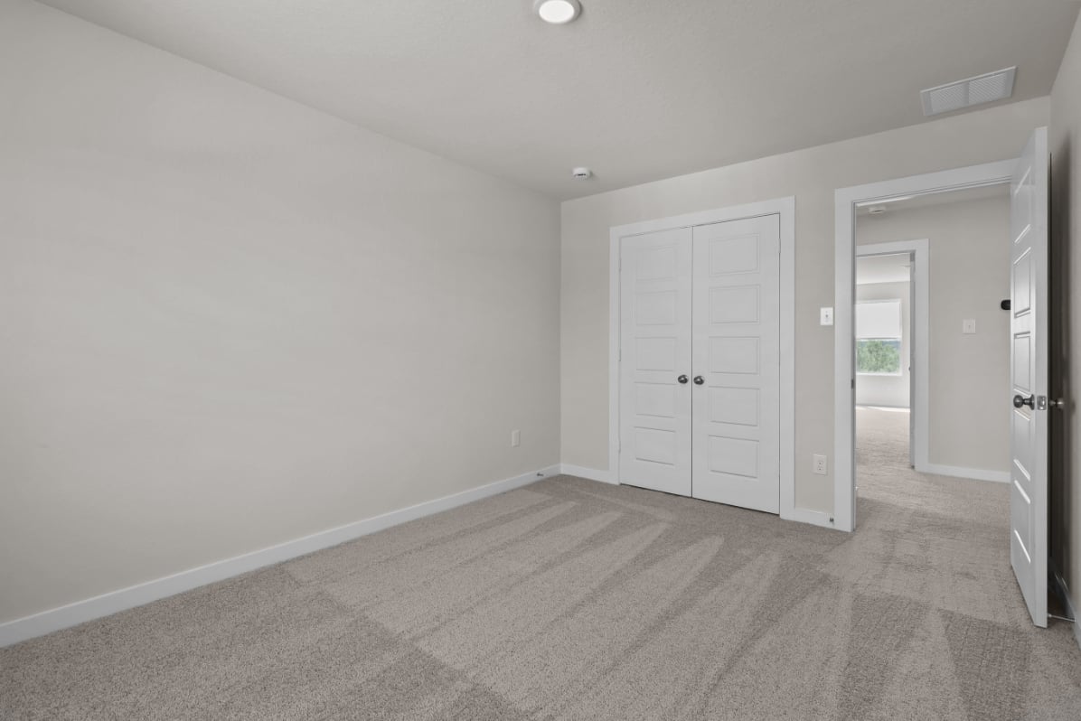 A room with white doors.